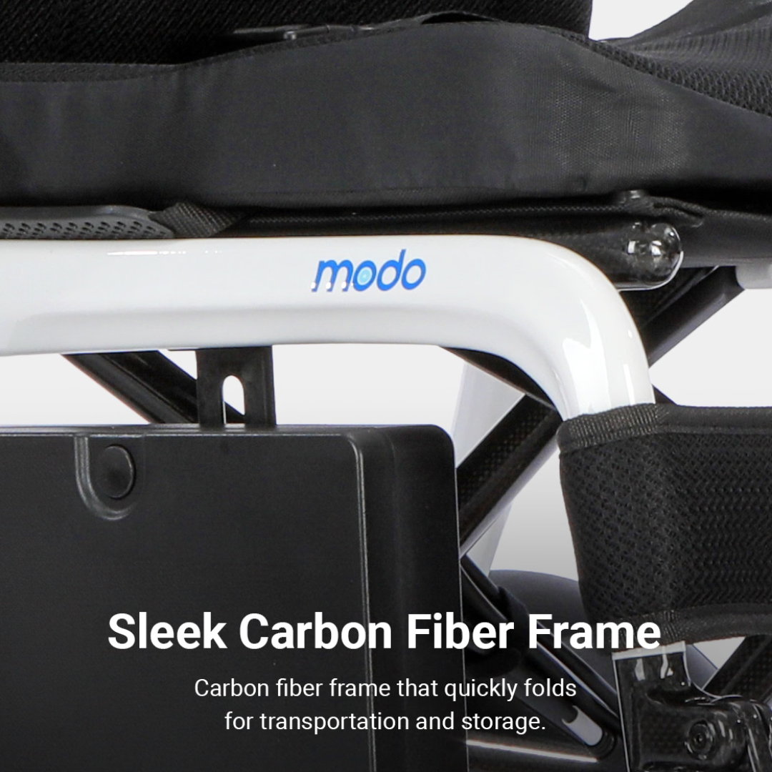Close-up of a wheelchair’s white carbon fiber frame with the word "modo" printed in blue, featuring sleek design elements and a storage compartment. This image highlights the foldable carbon fiber construction of the Whill MODO Breeze Ultra-Lightweight CF Folding Electric Wheelchair, which combines sophisticated style with exceptional portability.