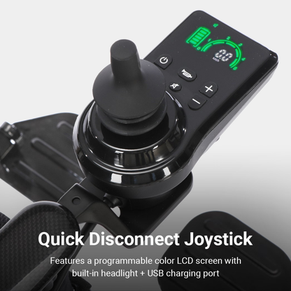 Close-up of a joystick controller with a digital LCD screen displaying icons and a green battery gauge; text reads “Quick Disconnect Joystick” with features listed below, highlighting the intuitive controls featured on the Whill MODO Breeze Ultra-Lightweight CF Folding Electric Wheelchair.