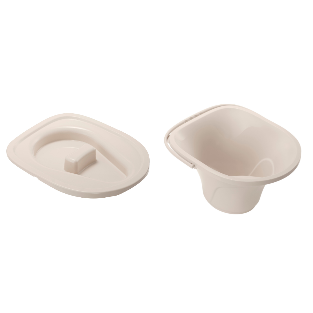 A beige plastic bedpan with a matching lid, placed side by side on a white background, looks similar to accessories used with the Wrappon® ORB - Portable Commode Toilet with Auto Waste Sealing.