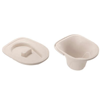 A beige plastic bedpan with a matching lid, placed side by side on a white background, looks similar to accessories used with the Wrappon® ORB - Portable Commode Toilet with Auto Waste Sealing.