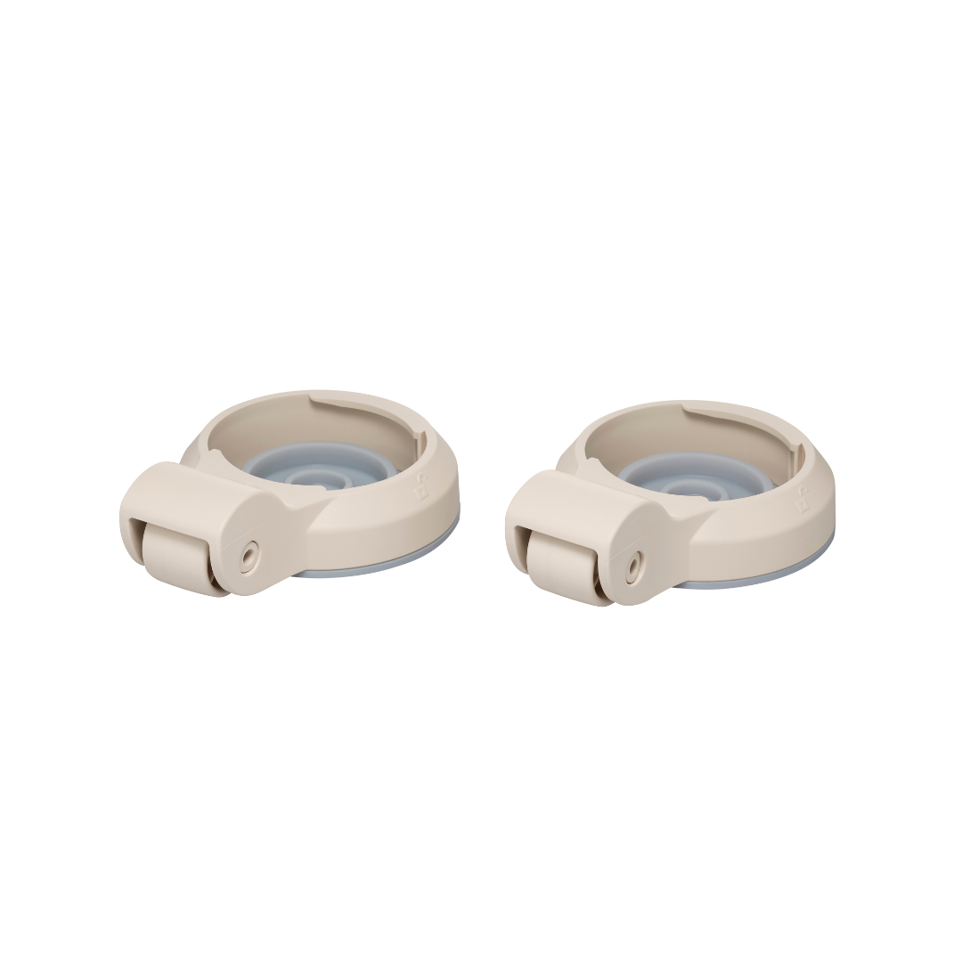 Two beige plastic caster wheels with round bases, likely spare parts for a Wrappon® ORB Portable Commode Toilet with Auto Waste Sealing, are shown side by side on a white background.