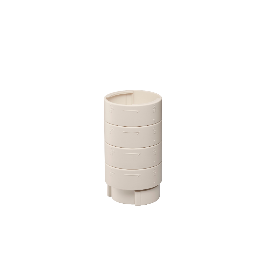 A beige, cylindrical plastic piece with four stacked segments—each featuring a right-pointing arrow and side notch—appears to be a part from the Wrappon® ORB Portable Commode Toilet with Auto Waste Sealing, shown on a plain white background.