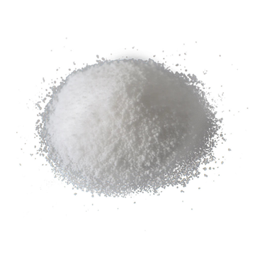 A mound of fine white powder, similar to salt or sugar, scattered on a white background—much like the Powder Coagulant 50 Count for Wrappon Orb Toilet used for sanitation support in portable toilets.