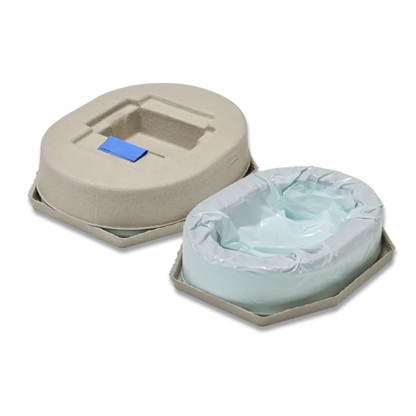 Two disposable bedpans compatible with the Wrappon® ORB Portable Commode Toilet are shown; one has a blue tab cover, while the other is open to display a plastic liner. Both are made of beige, cardboard-like material.