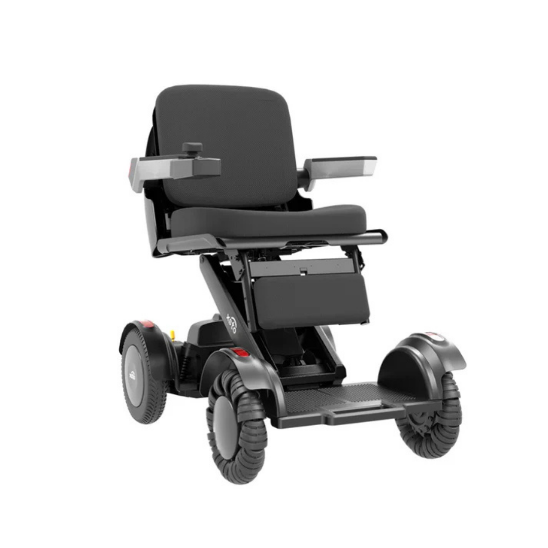 The XSTO M4 Mobility Robot Powerchair is a modern black electric wheelchair featuring large rear wheels, padded seat, armrests, and footrest—designed for travel-ready convenience and mobility assistance against a plain white background.