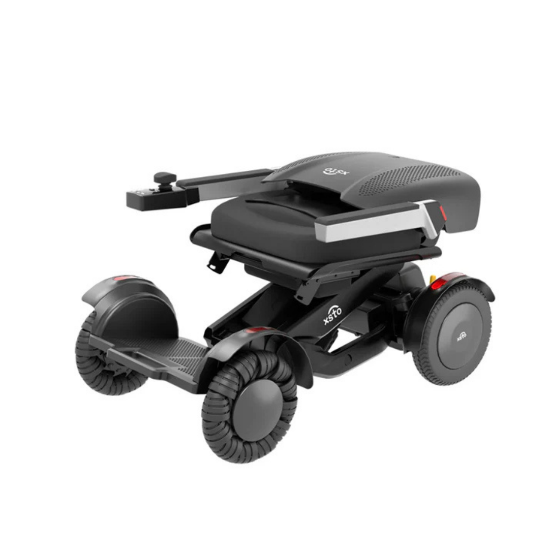The XSTO M4 Mobility Robot Powerchair is a compact, lightweight foldable wheelchair with four wheels, a black seat, and a joystick control on the armrest for easy mobility and effortless transport for seniors.