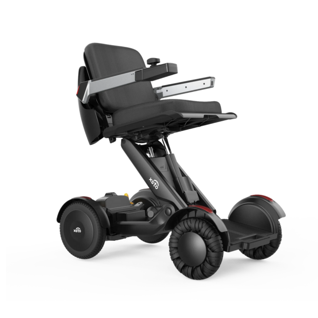 The XSTO Mobility M4 Self-Balancing Powerchair features four wheels, a black cushioned seat, armrests, and a sturdy frame. Its compact, sleek, and lightweight foldable design offers ideal personal mobility assistance.