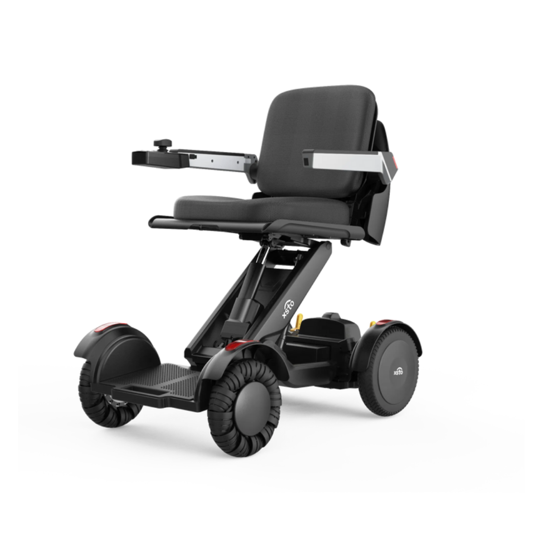 The XSTO Mobility M4 Self-Balancing Powerchair is a modern, compact black four-wheel electric wheelchair with an adjustable seat and armrests. Lightweight and foldable, it’s ideal for easy transport and both indoor and outdoor travel.