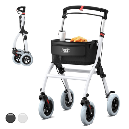 A white slim foldable indoor rollator walker with four wheels, featuring a black storage basket holding a plate of croissants and a cup, is shown alongside two available color options (black and white) at the bottom left. The VOCIC Z32 Slim Foldable Indoor Rollator with one-Handed Brake is designed to offer effortless mobility around your home.
