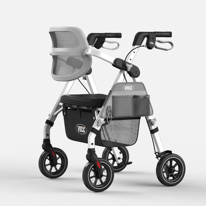 The ErgoGrand Bariatric Rollator Walker | VOCIC Z58 is a silver and black rollator with four wheels, featuring a cushioned seat, mesh backrest, storage baskets, and hand brakes for enhanced mobility assistance. For comprehensive information on dimensions and features, please refer to the product specification table.