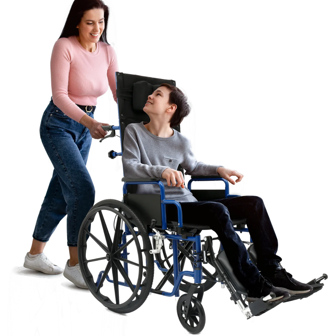 A woman in a pink sweater and jeans smiles as she pushes a young person, wearing a gray sweater and black pants, in a Circle Specialty ZIGGO Pro Reclining Pediatric Wheelchair. Both are smiling against a white background.