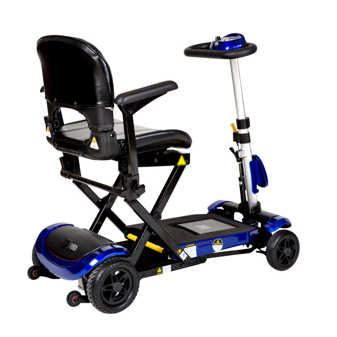 The Drive ZooMe Auto-Flex Folding Travel Scooter features automatic folding, a blue frame, black seat, and armrests—designed for easy personal transportation and compact storage.