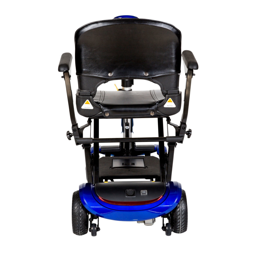 A rear view of the Drive ZooMe Auto-Flex Folding Travel Scooter in blue, featuring a black seat, armrests, visible wheels, backrest, and part of the base, isolated on a white background.