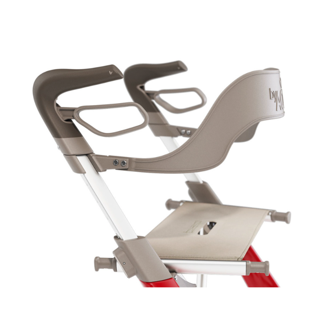 Close-up of a modern, brown and silver high chair seat with armrests and footrest, inspired by the ByACRE Ultralight Carbon Fiber Rollator's sturdy frame. Designed for toddlers, it offers minimalist lines and ergonomic comfort.