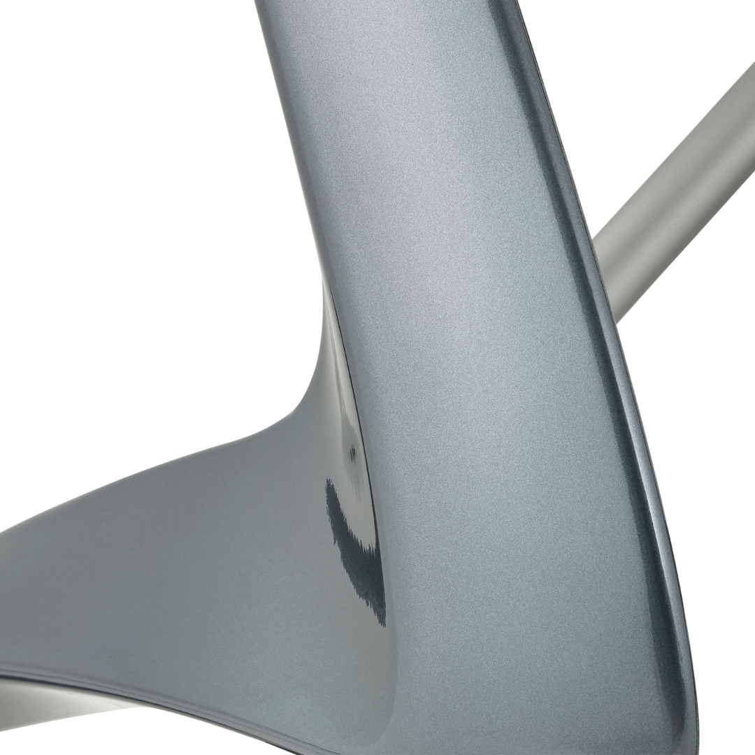 Close-up of the ByACRE Carbon Overland All-Terrain Rollator, featuring a sleek, curved metallic structure with a smooth silver finish and reflective surface—showcasing its modern travel gear design.