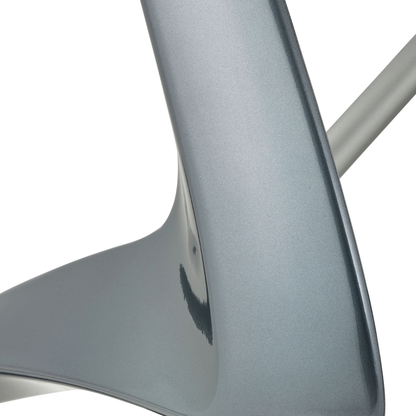 Close-up of the ByACRE Carbon Overland All-Terrain Rollator, featuring a sleek, curved metallic structure with a smooth silver finish and reflective surface—showcasing its modern travel gear design.