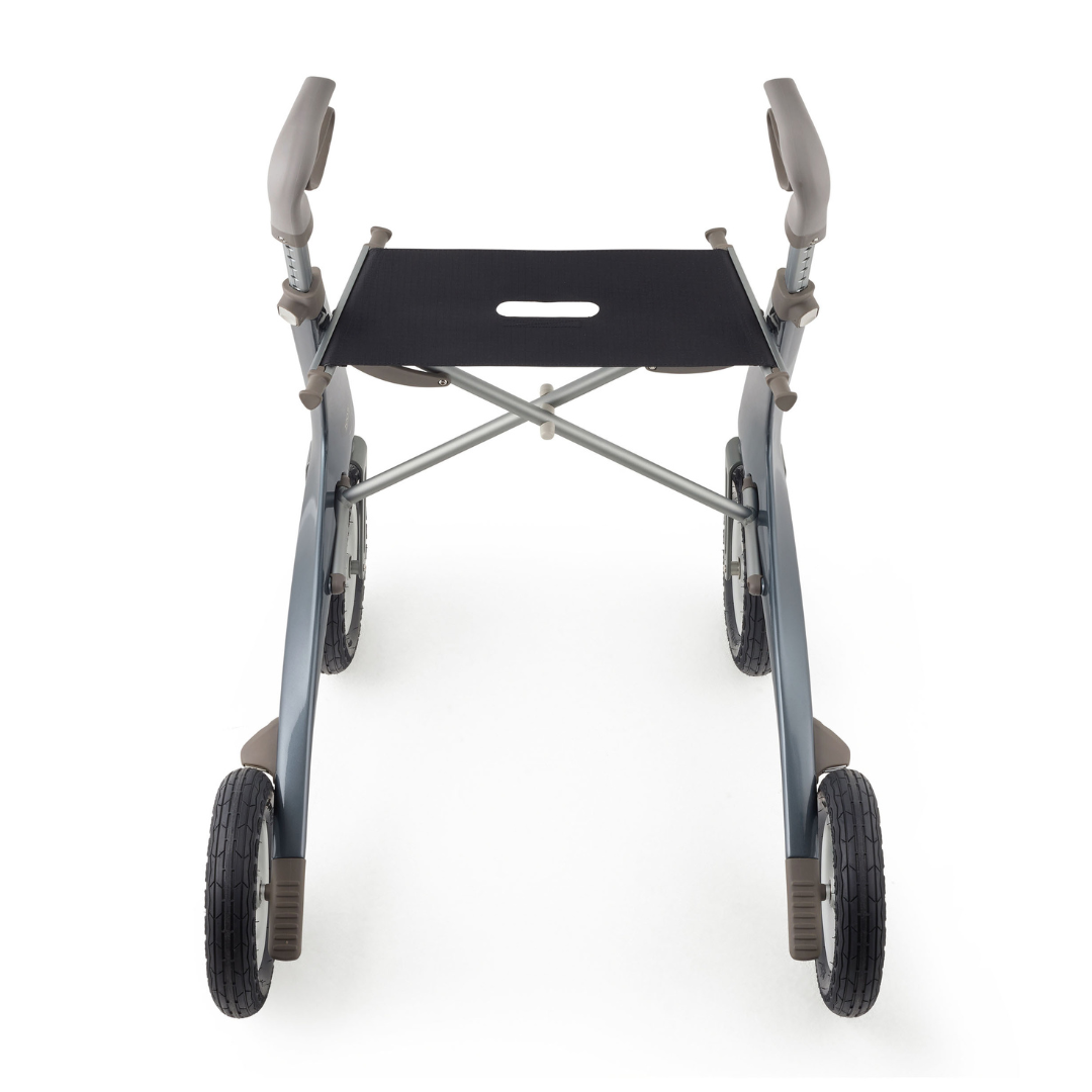 Top view of the ByACRE Carbon Overland All-Terrain Rollator, featuring four large wheels, ergonomic handles, and a black fabric seat on a metallic frame—your perfect adventure companion on a white background.