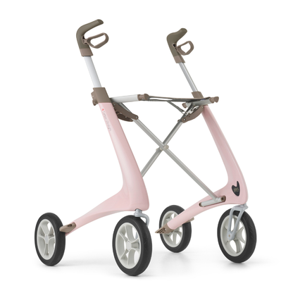 The ByACRE Ultralight Carbon Fiber Rollator (10.6 lbs) features a modern, minimalist pink frame inspired by strollers, four black-and-white wheels, ergonomic handles, and a seat-free lightweight design.