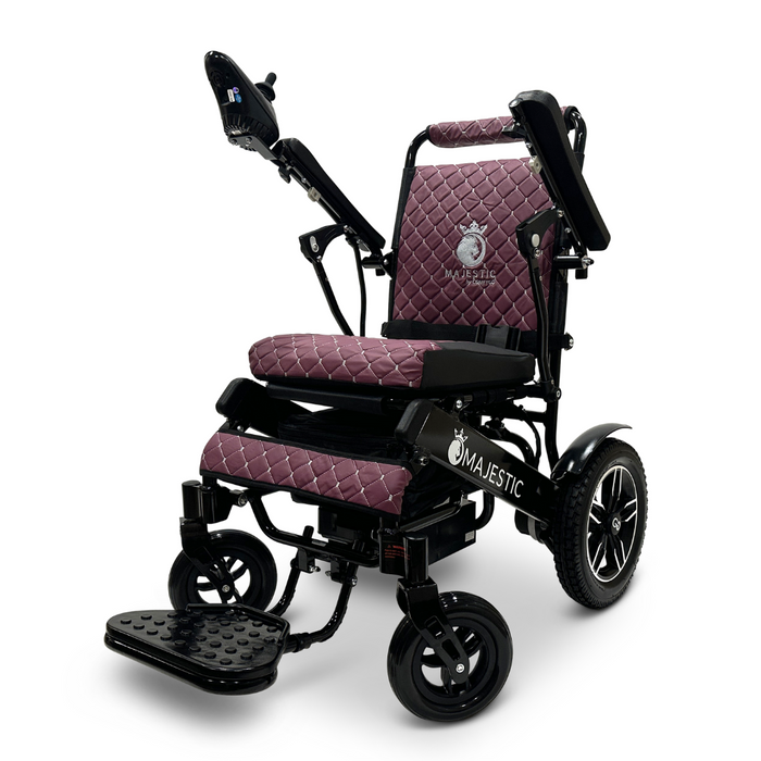 The ComfyGo MAJESTIC IQ-8000 Remote Controlled Lightweight Electric Wheelchair is a contemporary, travel-friendly option featuring a sleek design. It showcases quilted maroon upholstery, large black wheels, and adjustable armrests. Despite being lightweight, it offers robust support with a front-positioned footrest and an intuitive control panel located on the right armrest.