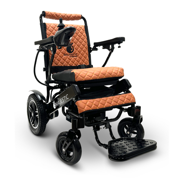 Introducing the ComfyGo MAJESTIC IQ-8000—a chic and portable electric wheelchair boasting a lightweight black frame with a plush brown seat and backrest. Designed for user comfort and mobility, it comes equipped with armrests, a joystick control on one side, and four robust wheels.