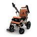 Introducing the ComfyGo MAJESTIC IQ-8000, a sleek tan quilted electric wheelchair that combines style and functionality. Equipped with black armrests and wheels, this lightweight model includes a convenient footrest and joystick control. The "Majestic" branding on the frame complements its high backrest, designed for enhanced comfort and support, making it an ideal travel companion for active individuals.