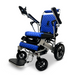 The ComfyGo MAJESTIC IQ-8000 Remote Controlled Lightweight Electric Wheelchair features a metallic travel-friendly frame with the brand name Majestic on the side. It boasts a vibrant blue cushion with a diamond pattern, a joystick controller, a footrest, and sturdy black wheels.