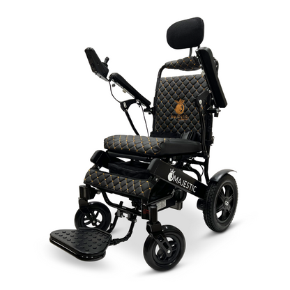 Introducing the ComfyGo MAJESTIC IQ-9000 Auto Recline Remote Controlled Electric Wheelchair, a modern marvel featuring black quilted upholstery and gold accents. It is equipped with brushless silent motors and offers adjustable headrest, armrests, and footrest for maximum comfort. Designed to handle varied terrain with its sturdy wheels, this wheelchair ensures smooth navigation using its digital joystick controller.