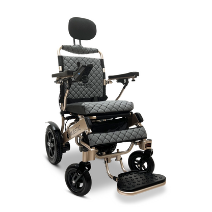 Introducing the ComfyGo MAJESTIC IQ-9000 Auto Recline Remote Controlled Electric Wheelchair, a sleek and modern electric marvel with a quilted black and gold design. It features a cushioned seat and headrest, digital joystick controller on the armrest, brushless silent motors for smooth rides, and boasts two large rear wheels and two smaller front wheels.