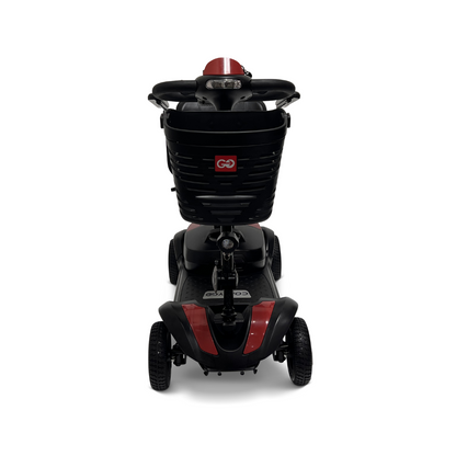 Introducing the ComfyGo Z-4 Ultra-Light Electric Mobility Scooter, a red and black portable solution. Front view shows its sturdy base with four wheels for all-terrain use, a comfortable backrest, and a practical basket on the handlebars.