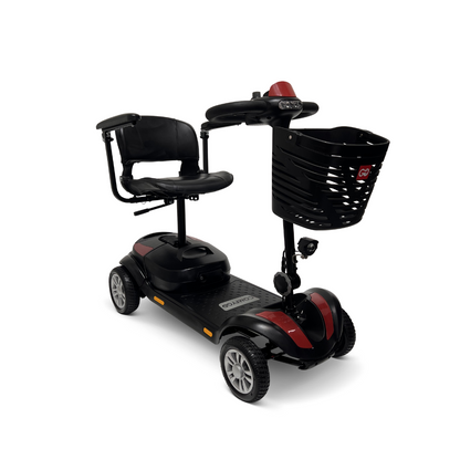 The ComfyGo Z-4 Ultra-Light Electric Mobility Scooter features a sleek black and red design, four wheels, a comfy seat, handlebars, and a front basket. Its compact frame ensures easy maneuverability and portability.