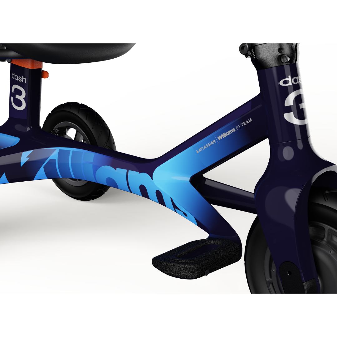 Close-up of the dashmoto® dash 3 Williams Carbon Fiber Scooter for kids in blue and dark purple, highlighting its frame, seat, and wheels with the “3” and “dash” visible on the frame. See specifications for more details.