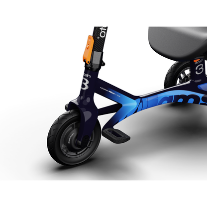Close-up of the dashmoto® dash 3 Williams Carbon Fiber Scooter's front wheel and frame, showcasing a dark blue and black design with orange accents, visible footrest, sleek curved lines, branding, and highlighted specifications.