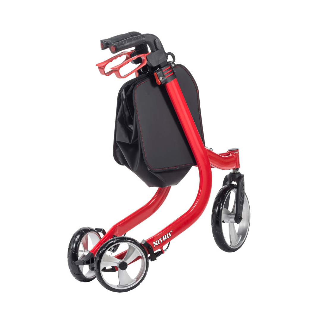 The Drive Nitro® 3-Wheel Rollator features a lightweight, red all-terrain Euro style design with a black storage bag and built-in handle, shown folded for easy transport or storage.