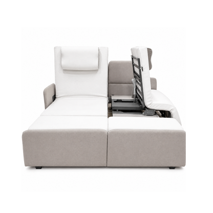 A modern sectional sofa in light gray and white features a raised backrest with an adjustable mechanism, echoing the innovative comfort of the Elevra Deluxe Rotating Lift Assist Bed - Dual King, shown on a white background.