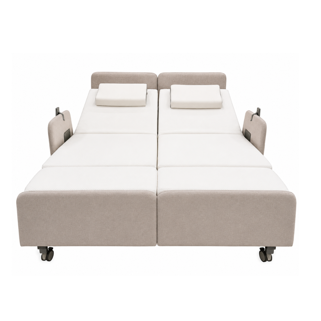 The Elevra Deluxe Rotating Lift Assist Bed - Dual King features two adjustable beds side by side with beige frames, white mattresses, matching rectangular pillows, head elevation, and wheels for mobility—perfect for advanced homecare.