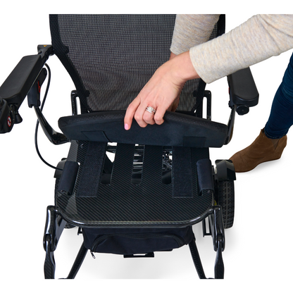 The seat cushion lifts very easily on the Golden Tech Carbon Fiber Cricket Power Wheelchair 
