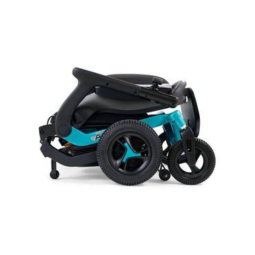 The Golden Tech Ally Folding Power Wheelchair with Mobile App Control rests on its side—an ideal travel companion. It features a sleek design with large front wheels, smaller rear wheels, and emphasizes portability and modern functionality.