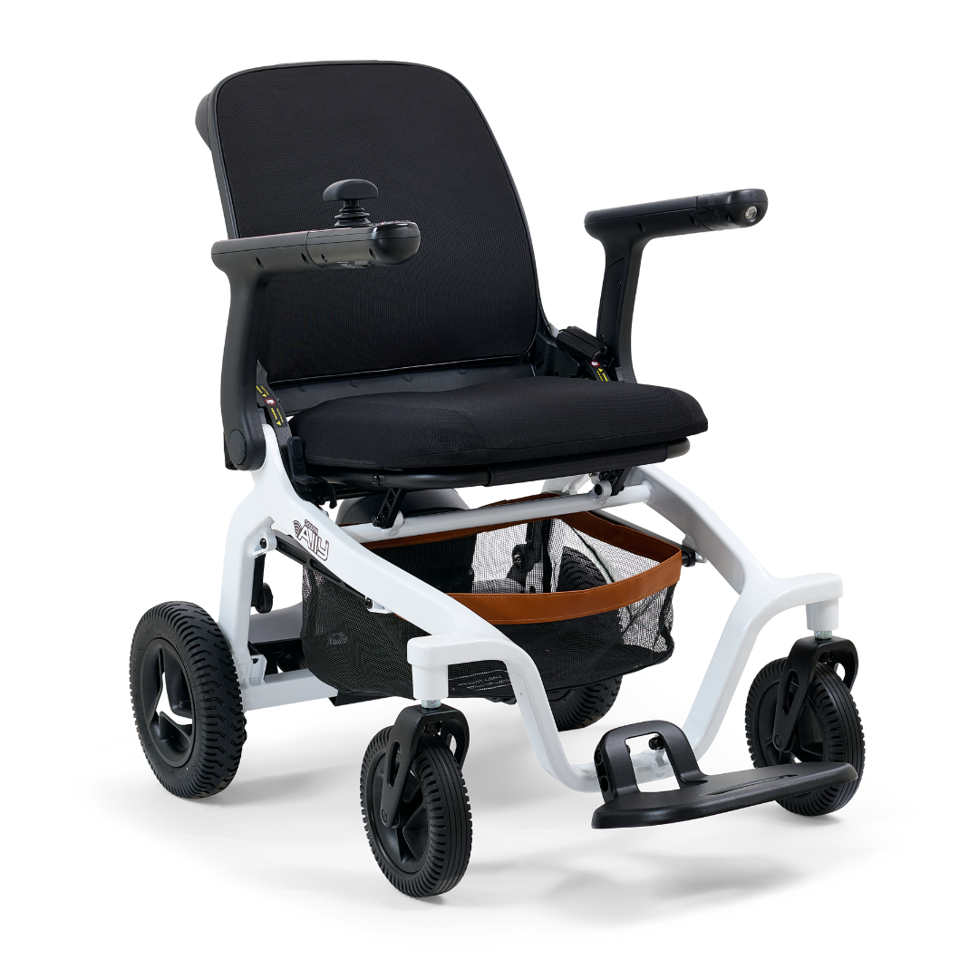 The Golden Tech Ally Folding Power Wheelchair combines a sleek white frame, black seat, and black/gray wheels. It includes a Smart Control Mobile App and right armrest joystick. Perfect for travel with its storage net underneath and footrest.