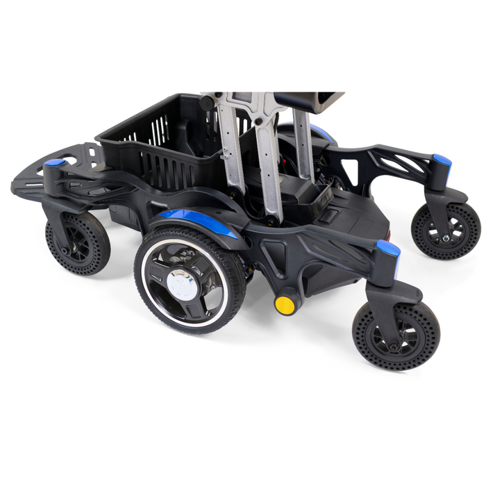 The Golden Tech GP130 Buzzaround CarryOn Portable Powerchair features a compact design with four wheels, a black frame, and blue accents. It includes 4-wheel suspension for smooth maneuverability and has a metallic basket perfect for holding a seat or platform.