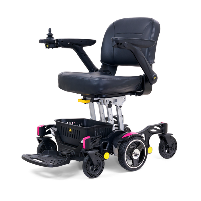 The Golden Tech GP130 Buzzaround CarryOn Powerchair is a black mobility scooter with 4-wheel suspension and padded seat, featuring joystick control on the right armrest, a footrest, a small basket, and bright yellow and pink accents for an ultra-compact, stylish design.