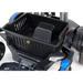 Close-up of a black basket on the Golden Tech GP130 Buzzaround CarryOn Portable Powerchair. The basket features ventilated sides with a logo, while the powerchair boasts a robust frame, 4-wheel suspension, large wheels, and blue details.