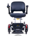 The Golden Tech GP130 Buzzaround CarryOn Portable Powerchair is an ultra-compact black mobility scooter with a cushioned seat, armrests, joystick control on the armrest, and four wheels with a 4-wheel suspension system. It also features red accents on the front.