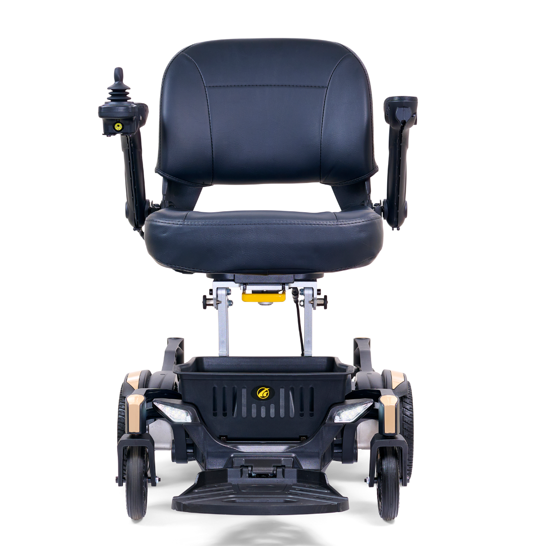 The Golden Tech GP130 Buzzaround CarryOn Portable Powerchair is a black folding wheelchair with a joystick on the armrest. It boasts an ultra-compact design, cushioned seat, armrests, and a sturdy frame with 4-wheel suspension for smooth navigation.