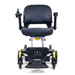 Front view of the Golden Tech GP130 Buzzaround CarryOn Portable Powerchair, black with padded seat and armrests. Features a joystick control on the right and a base accented in black and yellow with four small wheels for stability, perfect for urban mobility.