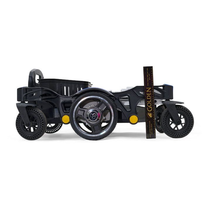 A sleek profile shot of the Golden Tech GP130 Buzzaround CarryOn Portable Powerchair in black is set against a white background. With its ultra-compact, three-wheel design and a ruler for scale, it features smaller front wheels, making it perfect for any adventure.