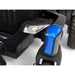 Close-up of the Golden Tech GP130 Buzzaround CarryOn Portable Powerchair, showcasing its sleek black body with blue accents and a multi-bulb LED headlight. The modern design features center wheel drive, with visible tire treads in the background.