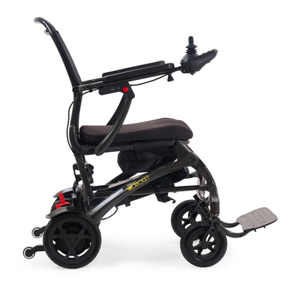 The Golden Tech Carbon Fiber Cricket Power Wheelchair, weighing only 33 lbs, is a lightweight black chair with right-arm joystick control, padded seat, folding frame, and footrest, shown from the side against a white background.
