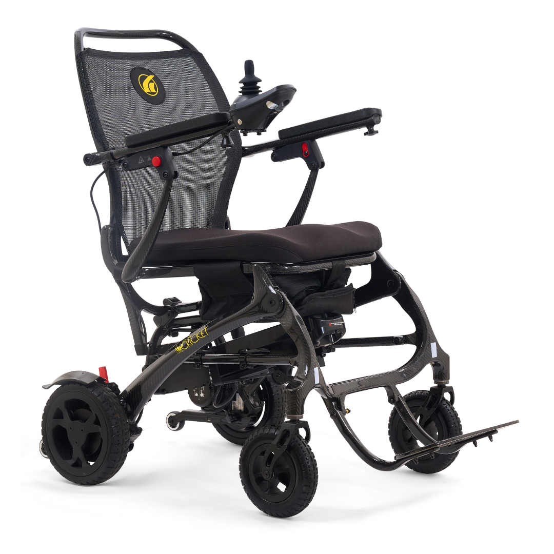 The Golden Tech Carbon Fiber Cricket Power Wheelchair weighs only 33 lbs and features a lightweight foldable frame, mesh backrest, padded seat, joystick armrest control, and four wheels for enhanced mobility and comfort.
