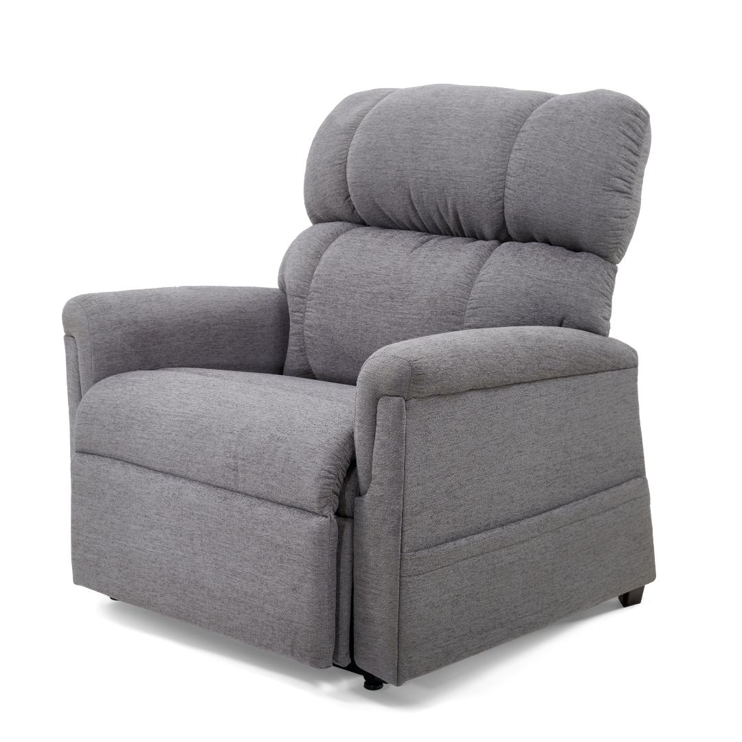 The Golden PR535 MaxiComfort Recliner w/ Lift Assist -Medium is a plush, gray chair with padded backrest and armrests. It features MaxiComfort Positioning for ergonomic support. The soft, textured fabric and angled design highlight the chairs comfort and spacious seating.