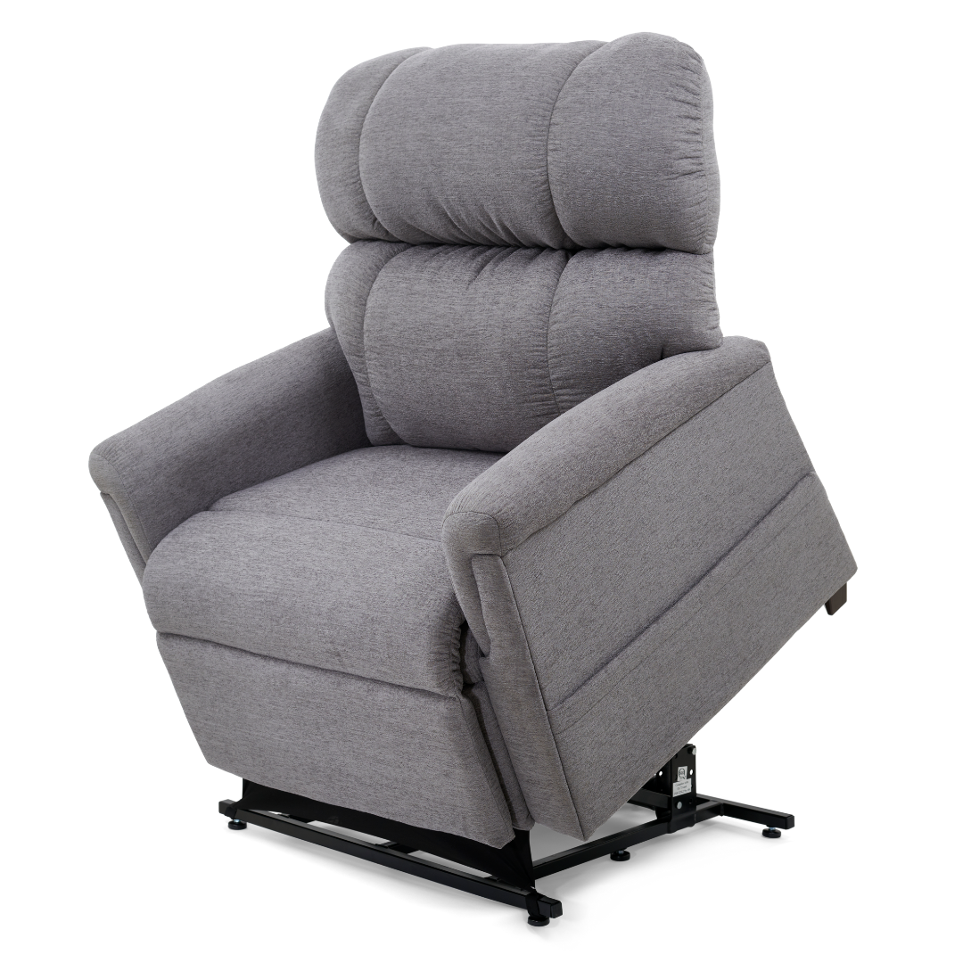 The Golden PR535 MaxiComfort Recliner w/ Lift Assist - Medium, from the Comforter Series, is a gray fabric chair with plush cushions, ergonomic support, and a black metal base. It features an elevated tilt with MaxiComfort Positioning.
